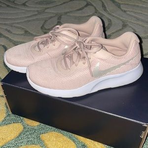 Nike light pink sneakers size 7.5! Lightly worn.